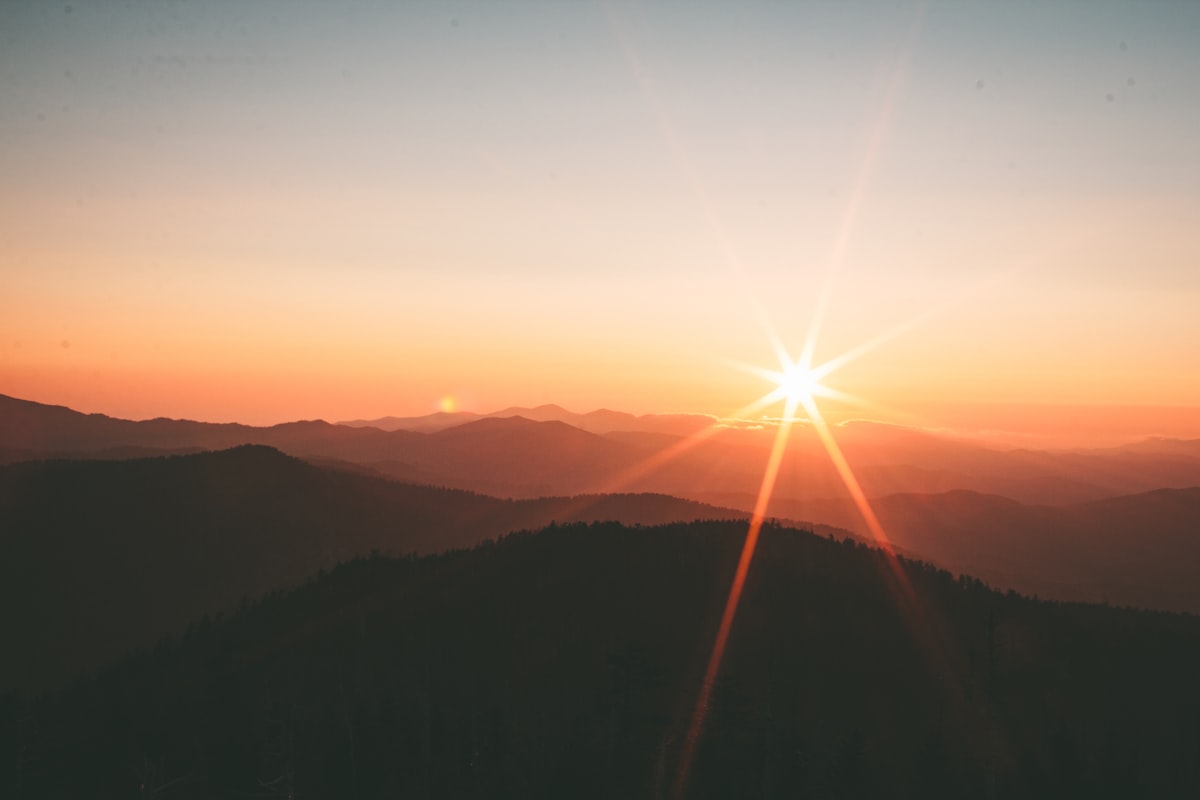 Mountain landscape with a lake at sunset